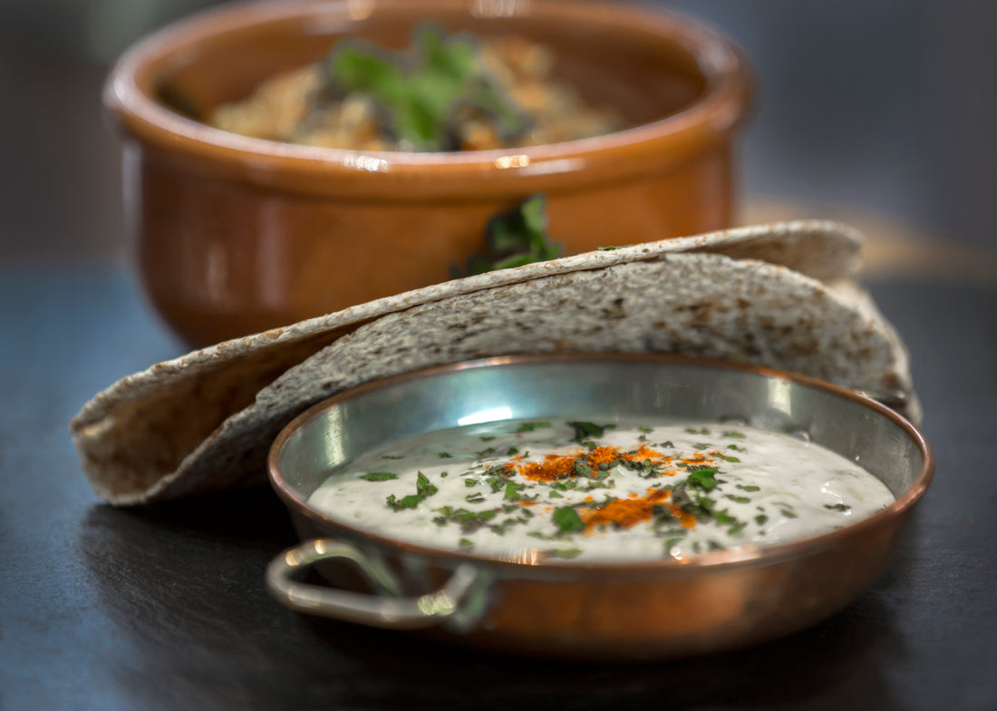 Peanut Cashew Curry served with chapati and raita