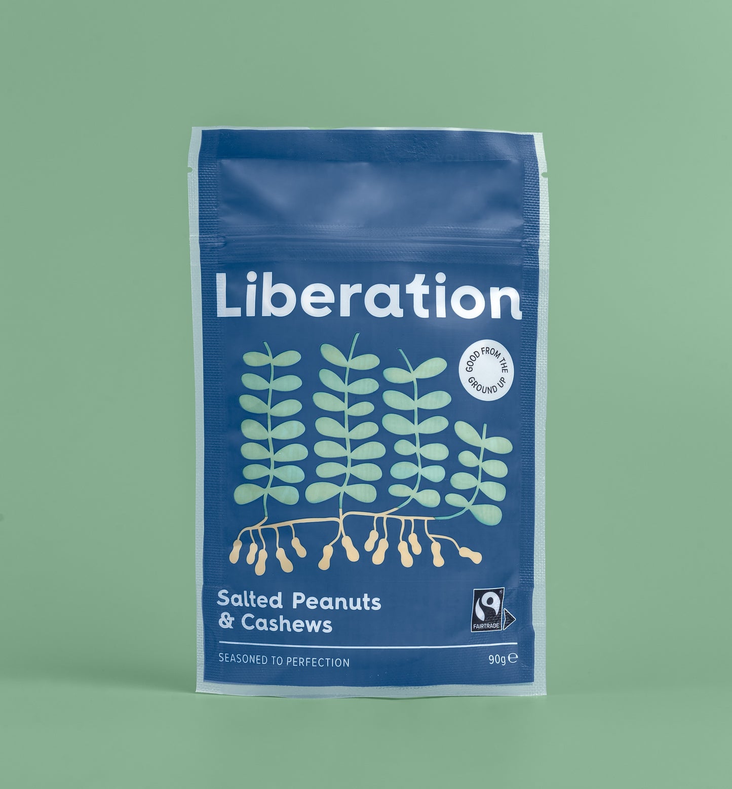 A bag of Liberation Salted Peanuts and Cashews with green background